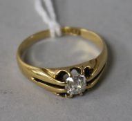 An 18ct gold and claw set solitaire diamond ring, size O.