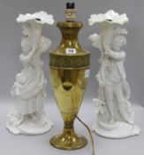 A pair of figural candlesticks and a lamp H.41cm