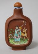 A Chinese Yixing enamelled snuff bottle, 19th century 7.5cm.