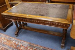 A mid Victorian carved walnut Renaissance style library table, W.148cm