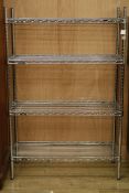A stainless steel four tier catering rack W.90cm
