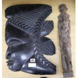 An African carved ebony carved face and a figure sculpture 55 & 54cm.