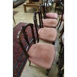 A set of 6 Victorian walnut dining chairs