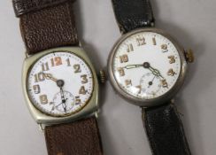 A gentleman's early 20th century silver military wrist watch and one other nickel cased wrist