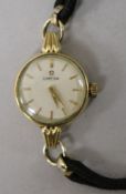 A lady's gold plated Omega manual wind wrist watch