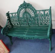 A Coalbrookdale "Arabesque" pattern cast iron green painted garden bench, W.122cm