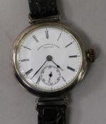 A gentleman's early 20th century silver manual wind wrist watch, retailed by Henry Birks & Sons.