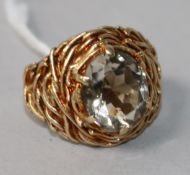 A textured 9ct gold and quartz dress ring, size M.
