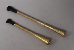 Two 9ct gold cigarette holders.