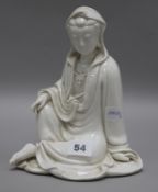 A Chinese blanc de chine seated figure of Guanyin H.21cm