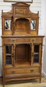 A late Victorian walnut side cabinet, Gillows of Lancaster, W.97cm