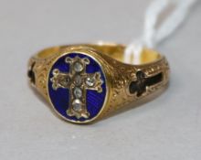A late Victorian yellow metal, diamond and enamel mourning ring with plaited hair within the