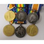 A WW1 machine gun pair of medals and 2 labour camp medals