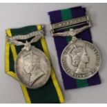 A Territorial Long Service medal and a Malaya medal