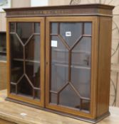 A small Edwardian inlaid mahogany cabinet W.28cm