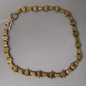 A late Victorian engraved 9ct gold necklace, 45cm.
