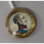 A late 18ct/early 19th century mourning pendant with bust of Comte d'Artois and plaited hair en