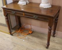 An Edwardian walnut writing table W.106cm