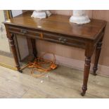 An Edwardian walnut writing table W.106cm