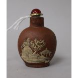 A Chinese Yixing pottery snuff bottle, manner of the Master of the Rocks 5cm.