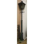 A metal electric lamp post W.32cm