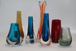 A Whitefriars ruby glass tankard, an 'elephant foot' vase and five other vases, including four