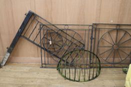 A pair of wrought iron gates, a similar fence panel and a horse feeder gates w.101cm.