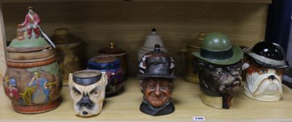 Two pottery 'dog head' tobacco jars and 10 other tobacco jars, various (12)