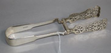 A pair of Victorian silver fiddle pattern asparagus servers, Francis Higgins II, London, 1853, 24.