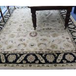 A Tabriz style carpet, with field of palmette scrolls on a beige ground, 12ft 2in. x 9ft 1in.