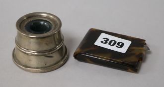 An Asprey silver mounted tortoiseshell matchbook holder and a silver inkpot (6) and salt spoon (3)