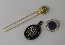 A late 19th century black onyx? and seed pear locket, a brooch and turquoise set hair pin.