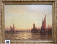 G.M. oil on board, Harbour at sunset, initialled, 22 x 29cm.