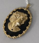 A modern 9ct gold, hardstone and diamond set pendant, applied with the bust of a lady to sinister,