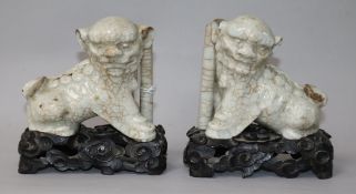 A pair of Chinese crackleglaze lion joss stick holders and stands H.11.5cm