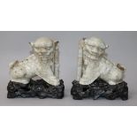 A pair of Chinese crackleglaze lion joss stick holders and stands H.11.5cm