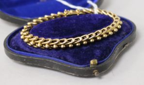An Edwardian 15ct gold oval and sphere link bracelet in fitted box.