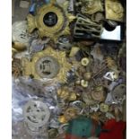 A collection of British Military cap badges, Third Reich, U.S Army badges etc