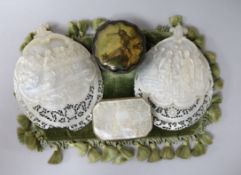 A Chinese mother of pearl snuff box, two Neapolitan carved plaques and a pressed metal snuff box