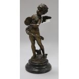 A bronze figure of a cherub H.29cm
