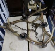 A stag antler light fitting W.84cm