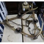 A stag antler light fitting W.84cm