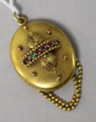 A Victorian yellow metal and gem set oval "Regard" pendant with chain swags, overall 46mm.