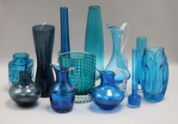 A collection of twelve Whitefriars and other blue-coloured glass vases, including an 'elephant's