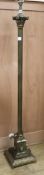 A brass corinthian column standard lamp W.24cm at base