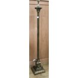 A brass corinthian column standard lamp W.24cm at base