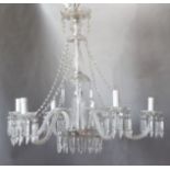 A Georgian style cut and moulded glass five light chandelier, with beaded swags and spear shaped