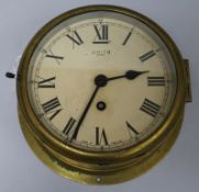 A Smith's brass bulkhead timepiece diameter 22.5cm
