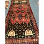 A Baluchi rug 337 x 150cm