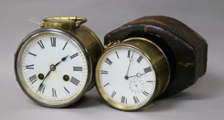 A French brass drum alarm carriage clock, Roman dial, in outer travelling case and another example